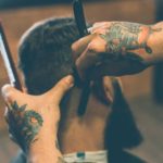 Barber using straight razor to earn more money